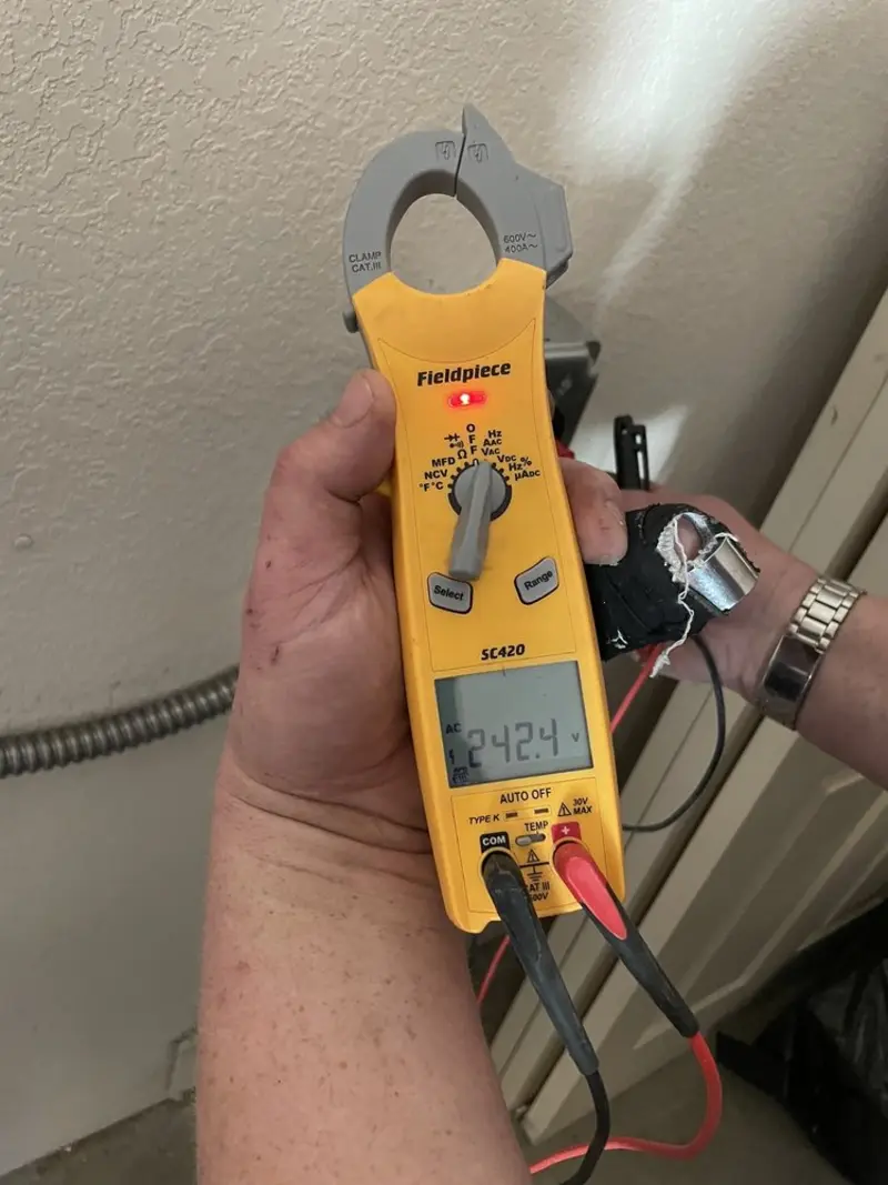 Voltage testing with clamp meter during Aluminum Wiring Replacement in Henrietta